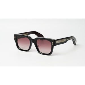 Black square sunglasses with gradient pink-tinted lenses and small gold geometric logo details on the temples, shown on a white background.