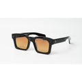 Black square sunglasses with warm orange gradient lenses, shown on a clean white background.