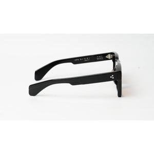 Black acetate square-frame sunglasses with a small silver-toned logo on the temple, shown from a side profile on a white background.
